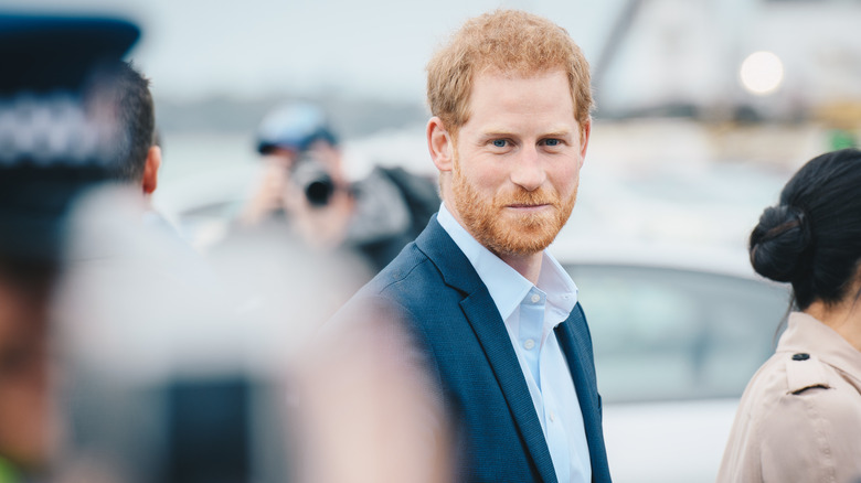 Prince Harry smiling for cameras