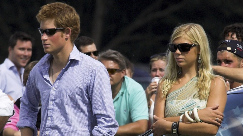Prince Harry and Chelsy Davy standing