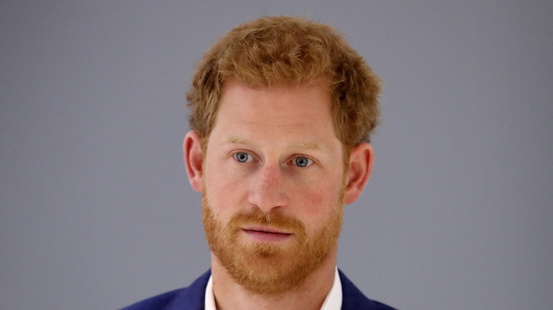 Prince Harry looking serious in close-up