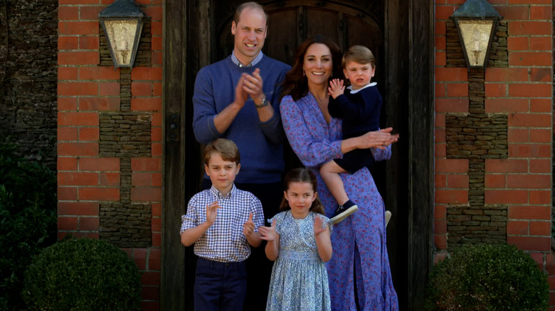 Kate Middleton, Prince William, and their kids posing