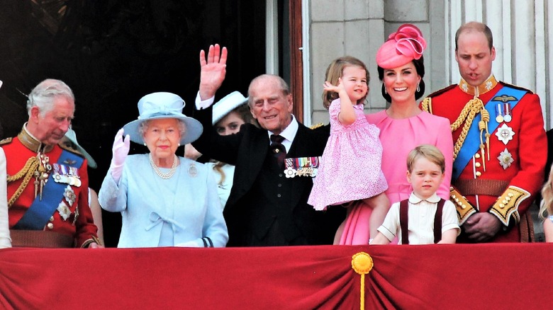 The royal family waving 