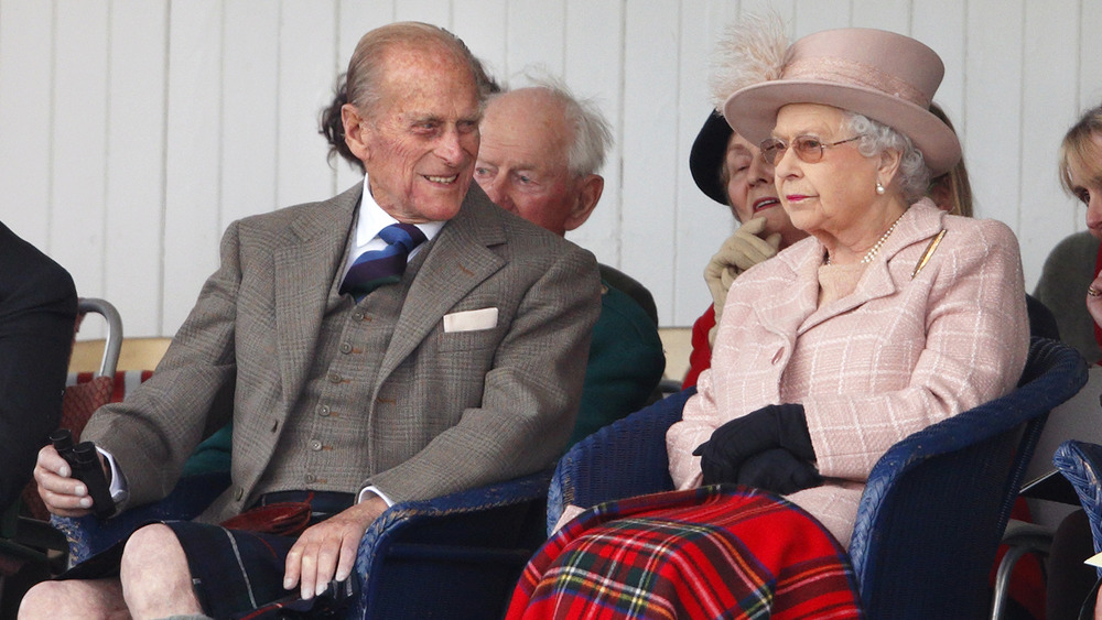 Prince Philip talking to Queen Elizabeth