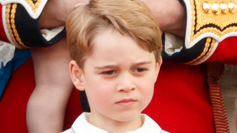 Prince George with a serious expression