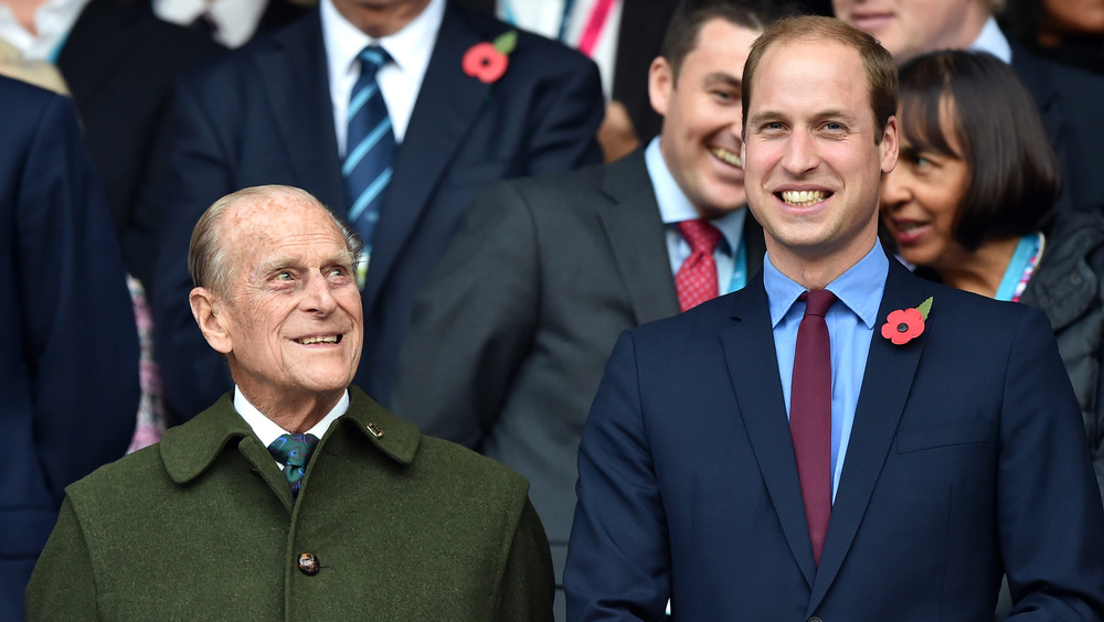 Prince Philip and Prince William share a laugh at a 2015 event