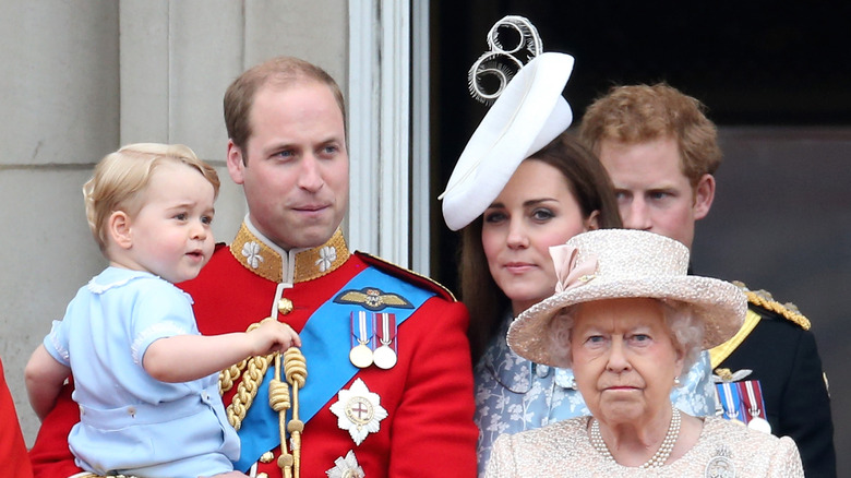 Prince William posing with Queen Elizabeth, Kate Middleton and Prince George