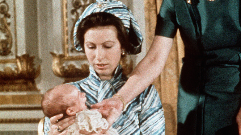 Princess Anne holding her baby