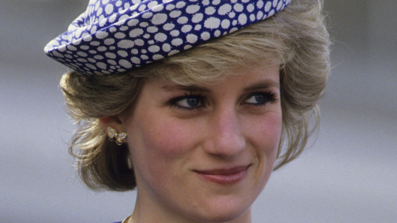 Princess Diana in a blue hat