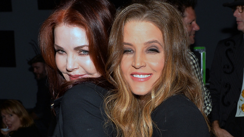 Priscilla Presley poses with Lisa Marie Presley