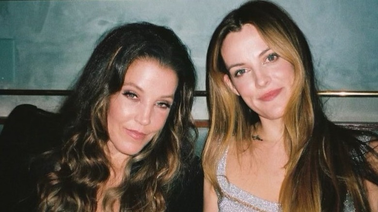 Lisa Marie Presley smiling with Riley Keough