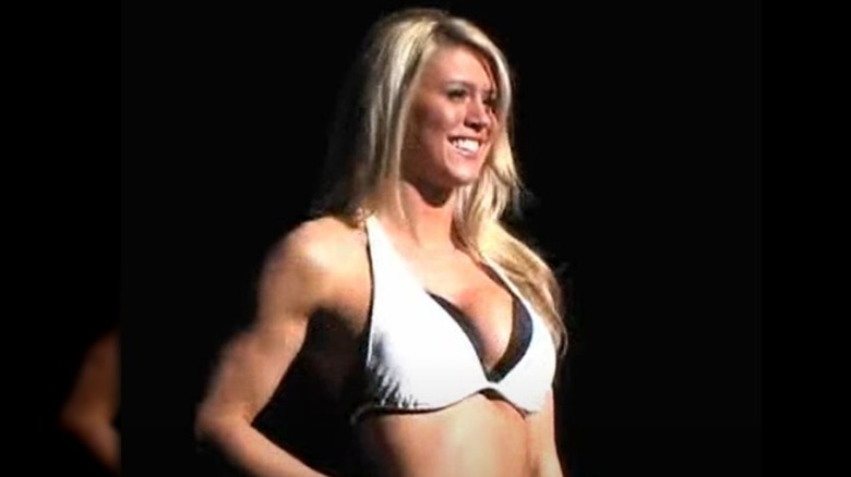 Tiffany Monroe onstage in bikini for cheerleading