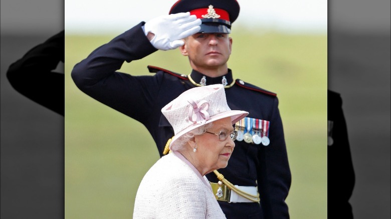 Soldier saluting Queen Elizabeth