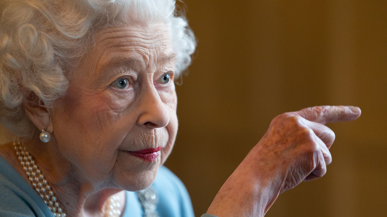 Queen Elizabeth II pointing