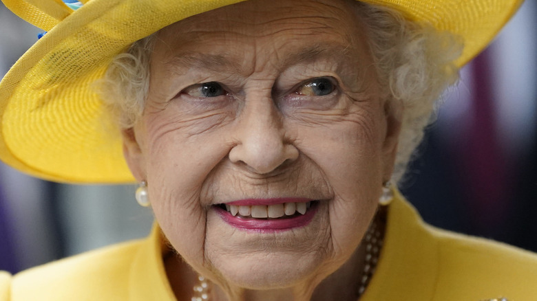 Queen Elizabeth II attending an opening 