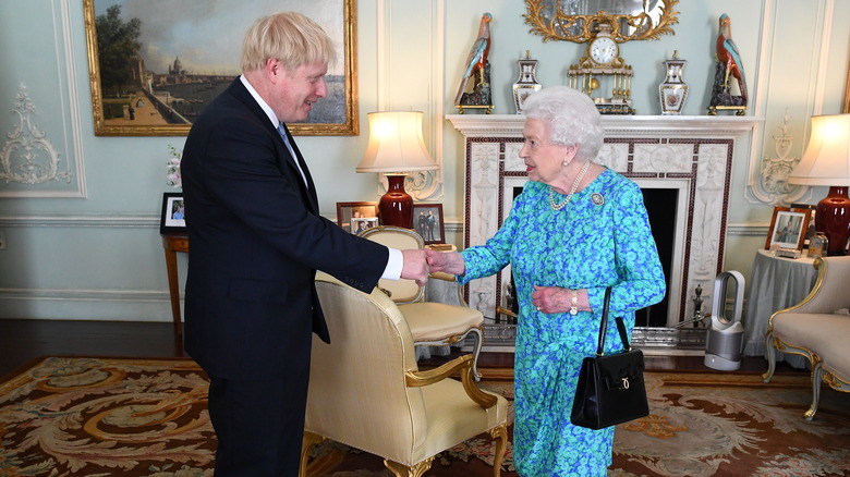 Boris Johnson and Queen Elizabeth greeting