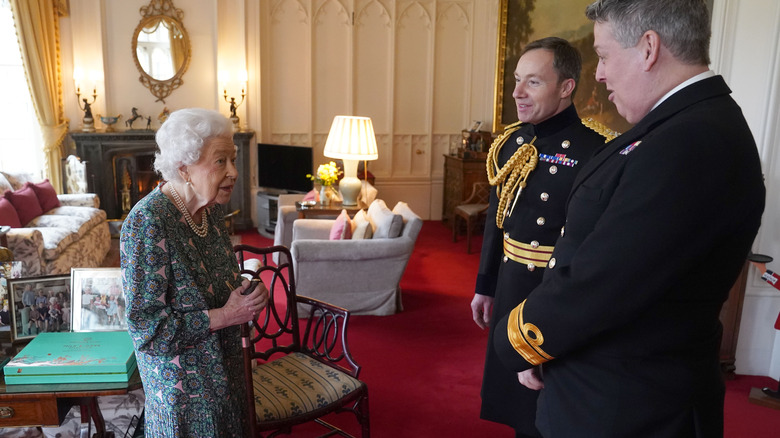 Queen Elizabeth meeting with military officials