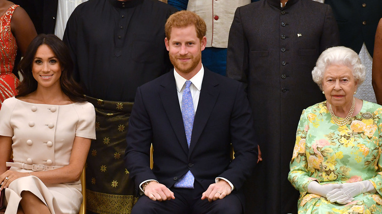 Meghan Markle, Prince Harry, and Queen Elizabeth