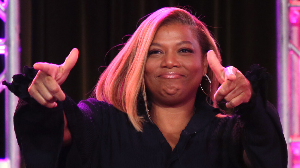 Queen Latifah giving a double thumbs up