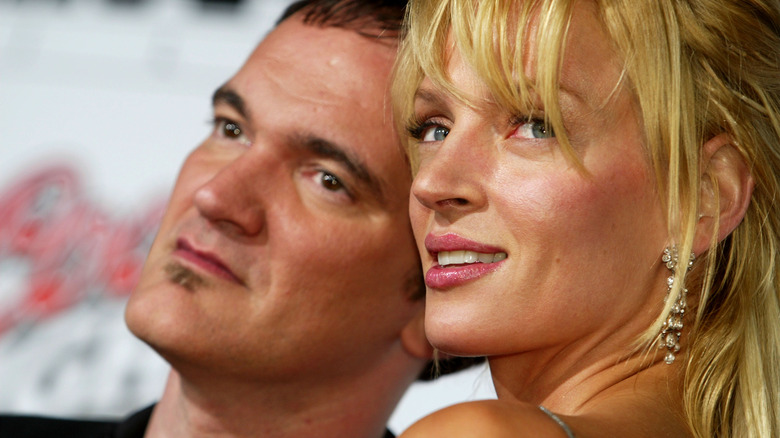 Quentin Tarantino and Uma Thurman posing together