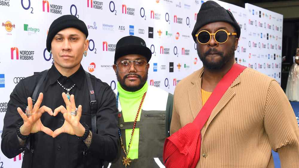 Black Eyed Peas showing heart sign