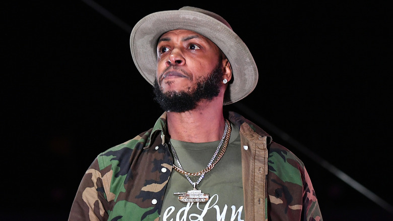 Mystikal on stage, looking up