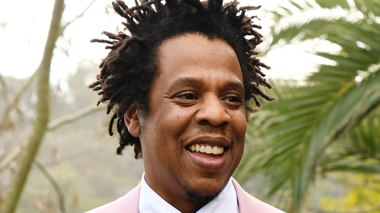 Jay-Z wearing a pink suit