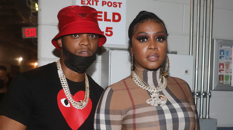 Papoose and Remy Ma look at camera