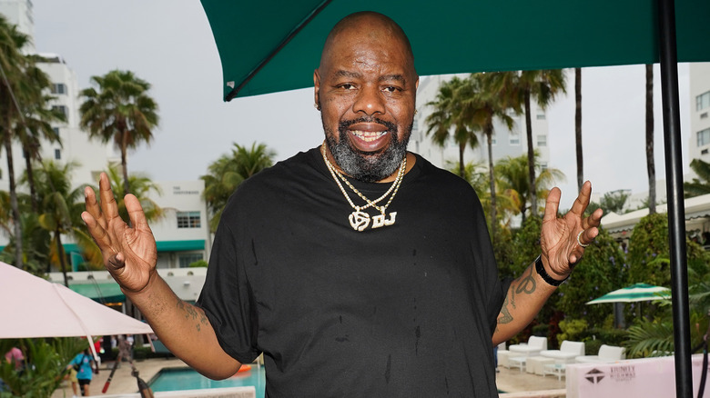 biz markie smiling with arms out