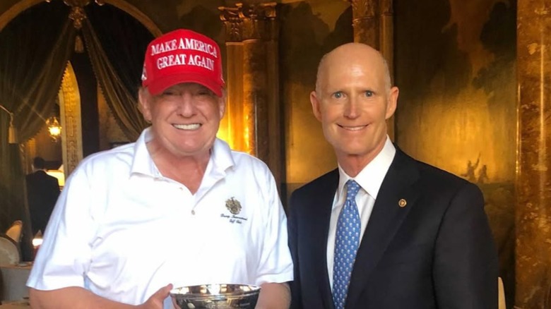 Donald Trump Rick Scott smiling