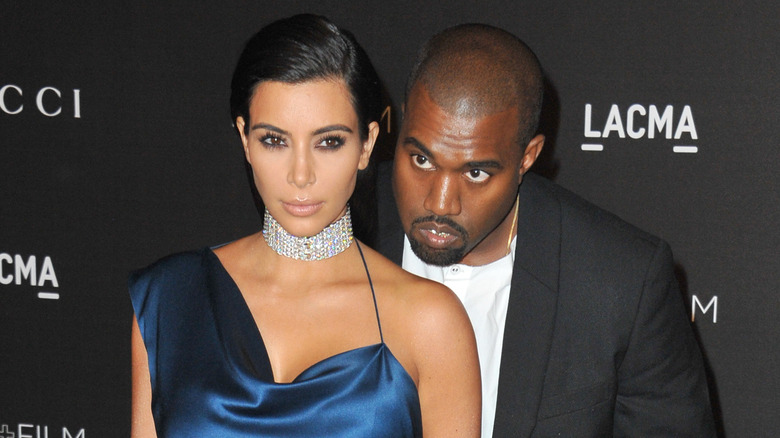 Kim Kardashian and Kanye "Ye" West posing