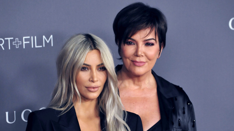 Kim Kardashian, Kris Jenner posing