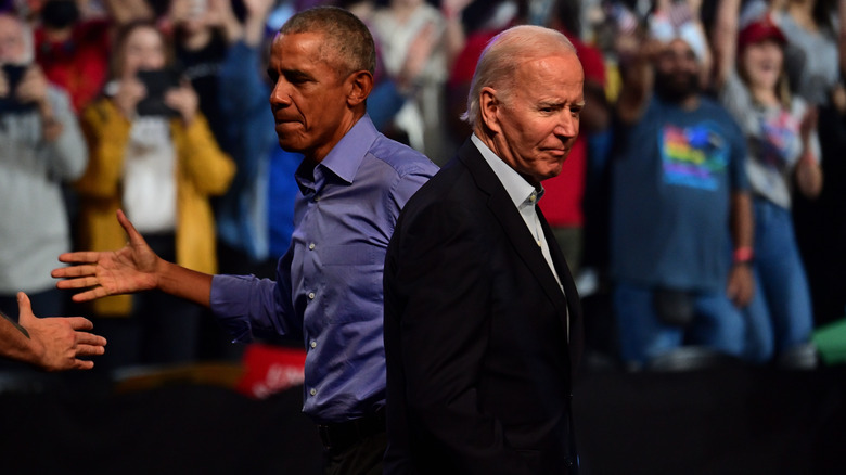 Barack Obama and Joe Biden looking in different directions