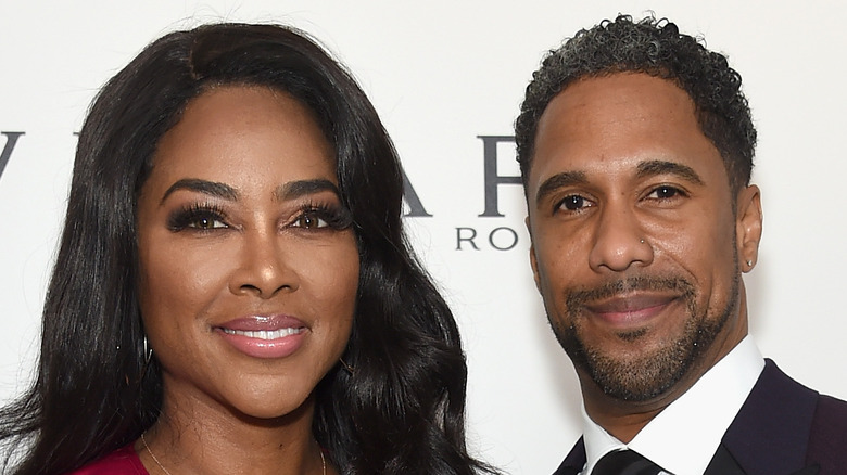 Kenya Moore Marc Daly smily red carpet