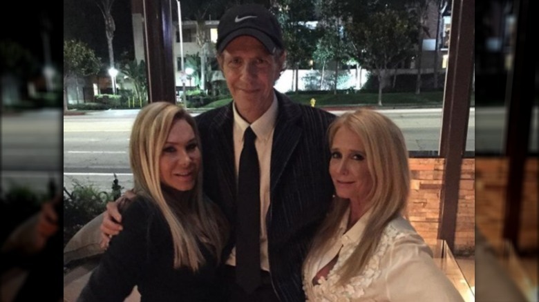 Adrienne Maloof, Monty Brinson, and Kim Richards posing for a photo