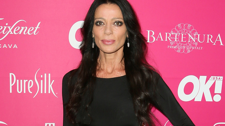 Carlton Gebbia posing pink background