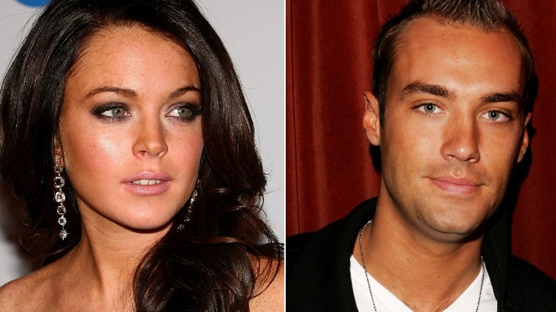 Lindsay Lohan looking to side, Calum Best smiling