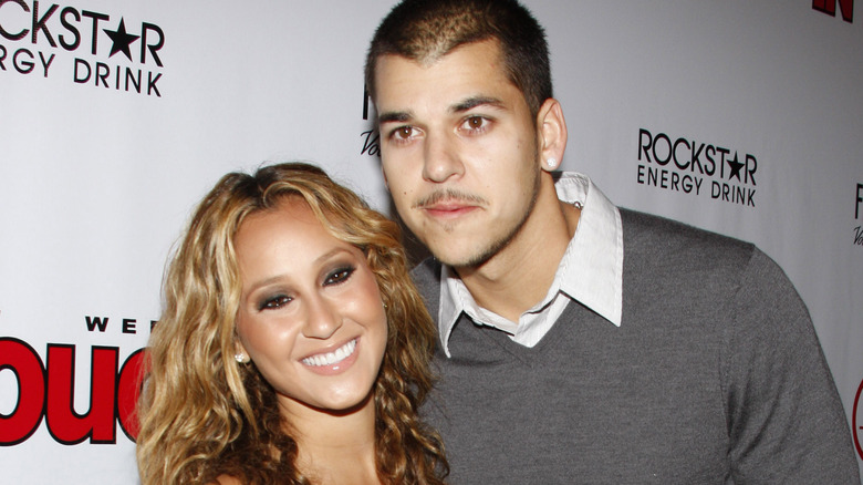 Rob Kardashian, Adrienne Bailon smiling