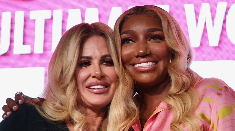 NeNe Leakes and Kim Zolciak hug