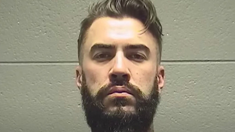 Connor Smith frowning in mugshot