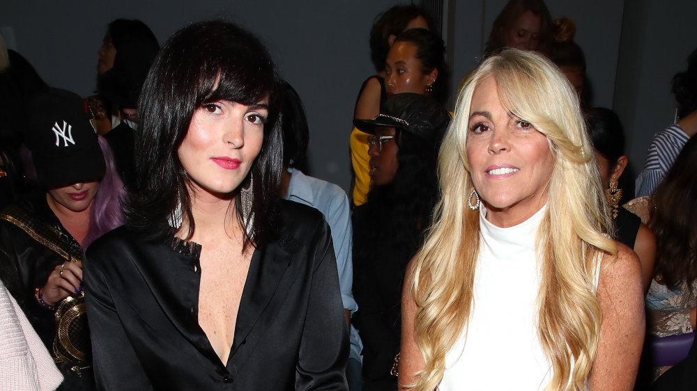 Aliana Lohan & Dina Lohan seated at a show