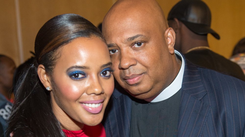 Angela Simmons with blue eyeshadow & Joseph Simmons