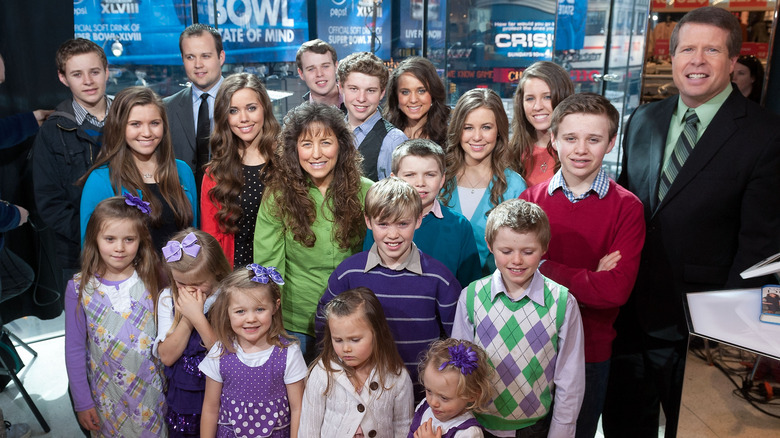 The Duggar family smiling