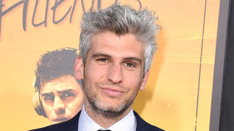 Max Joseph posing at an event