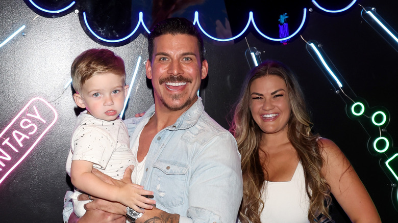 Jax Taylor and Brittany Cartwright pose with their son, Cruz