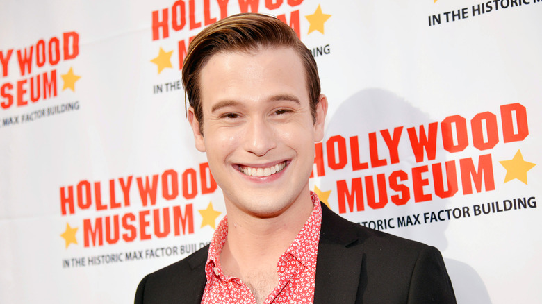 Hollywood Medium's Tyler Henry smiles