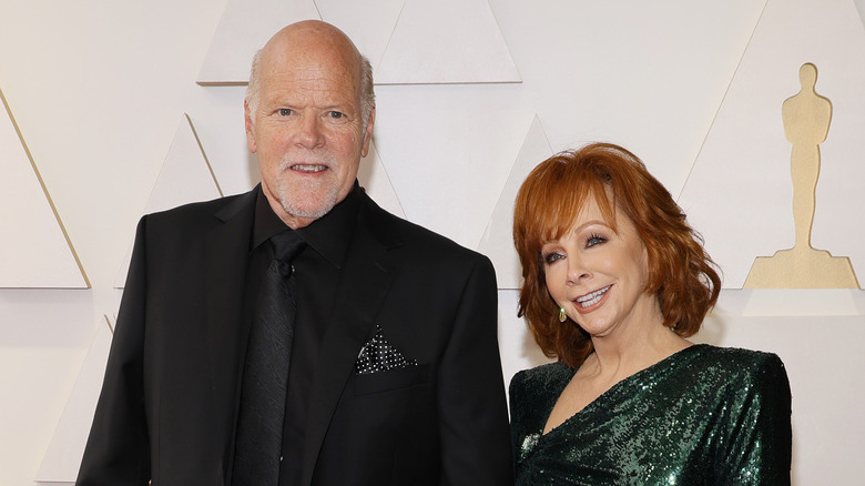 Rex Linn posing with Reba McEntire