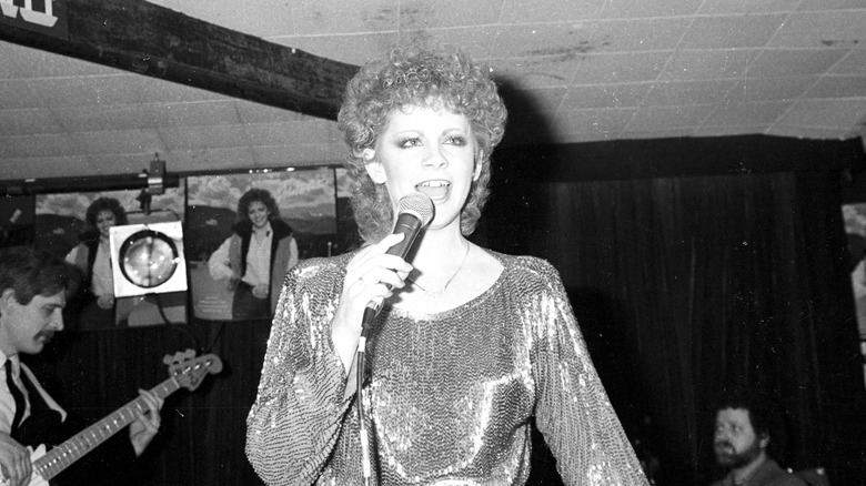 Reba McEntire performing early in her career