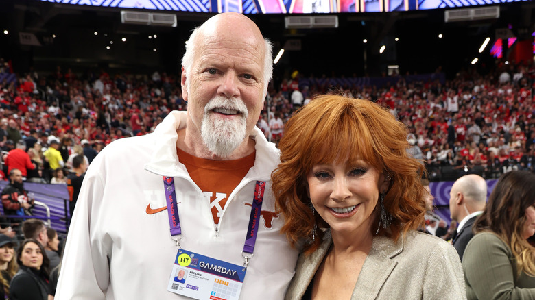 Reba McEntire and Rex Linn pose at the 2024 Super Bowl