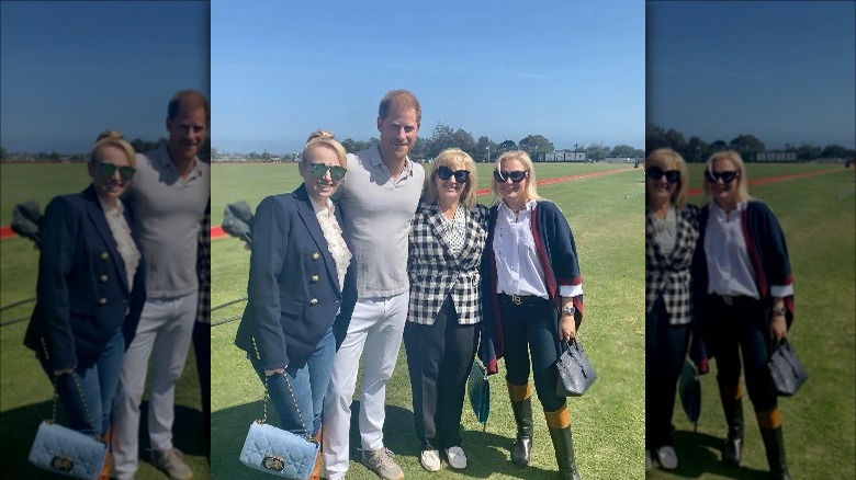 Rebel Wilson posing with Prince Harry