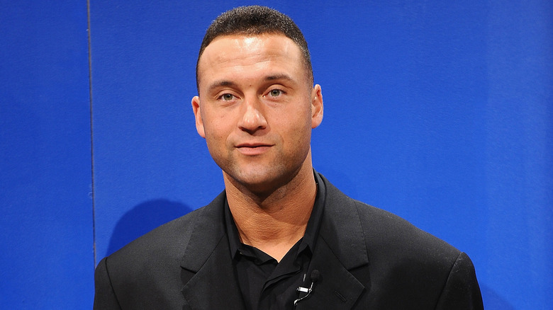 Derek Jeter wearing black jacket and shirt at an event for Gillette.