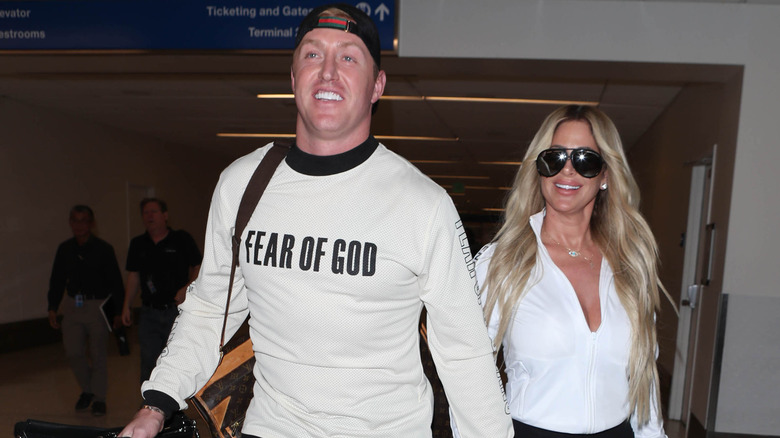 Kroy Biermann and Kim Zolciak at airport